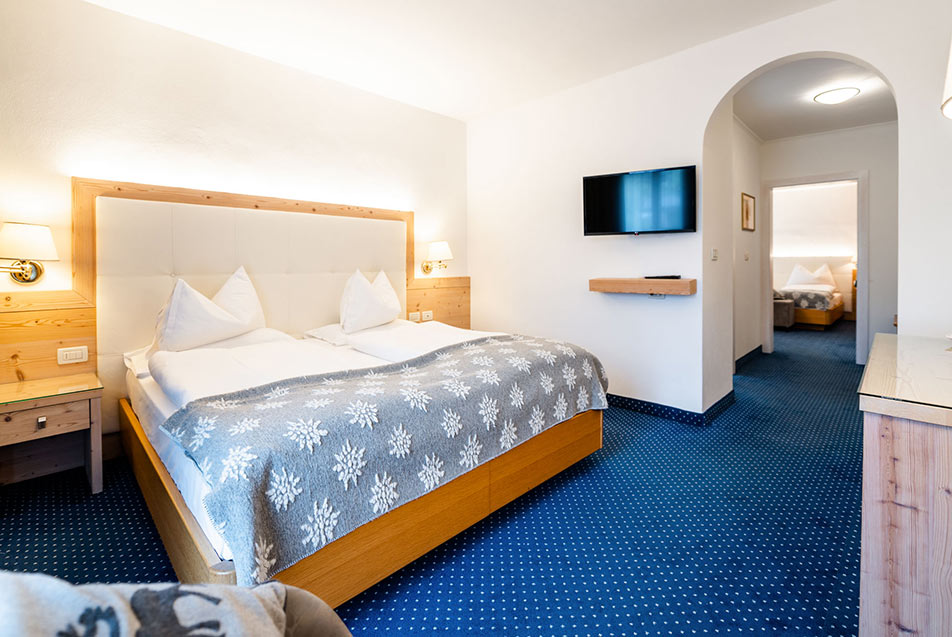 Family Suite blue at hotel Pralong in Selva Gardena